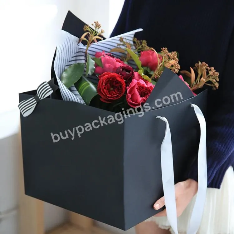 Fancy Wide Base Square Bottom Shopping Paper Bag With Flower Design And Handle