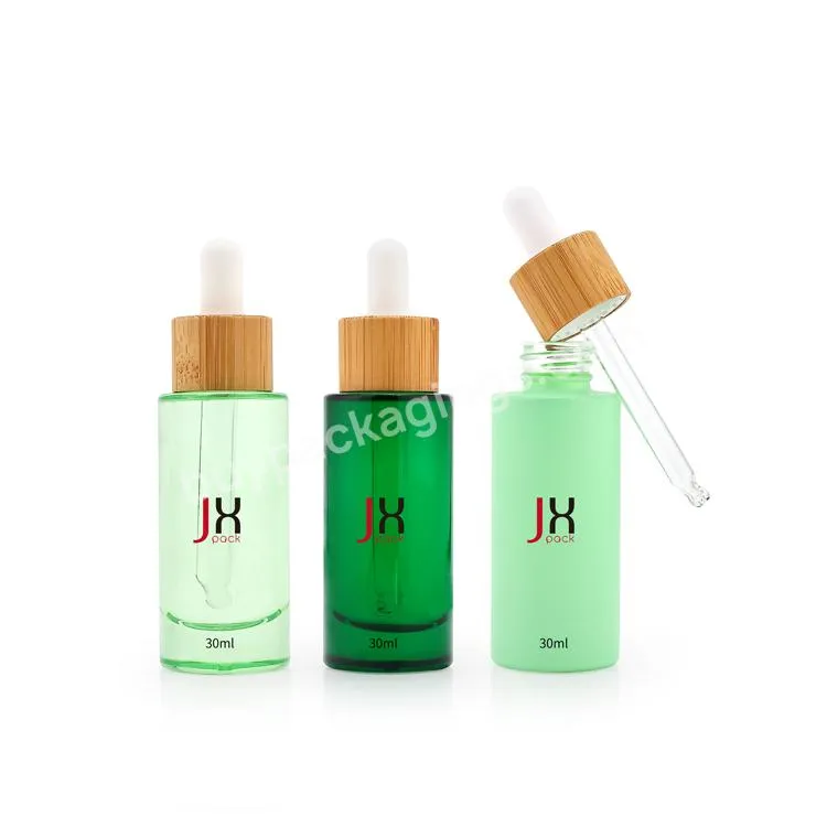 Wholesale Cosmetic Dropper Bottle 30 Ml Transparent Green Essential Oil Bottle With Bamboo Dropper Top - Buy Cosmetic Dropper Bottle 30 Ml,Transparent Green Bottle,Bamboo Dropper Top.