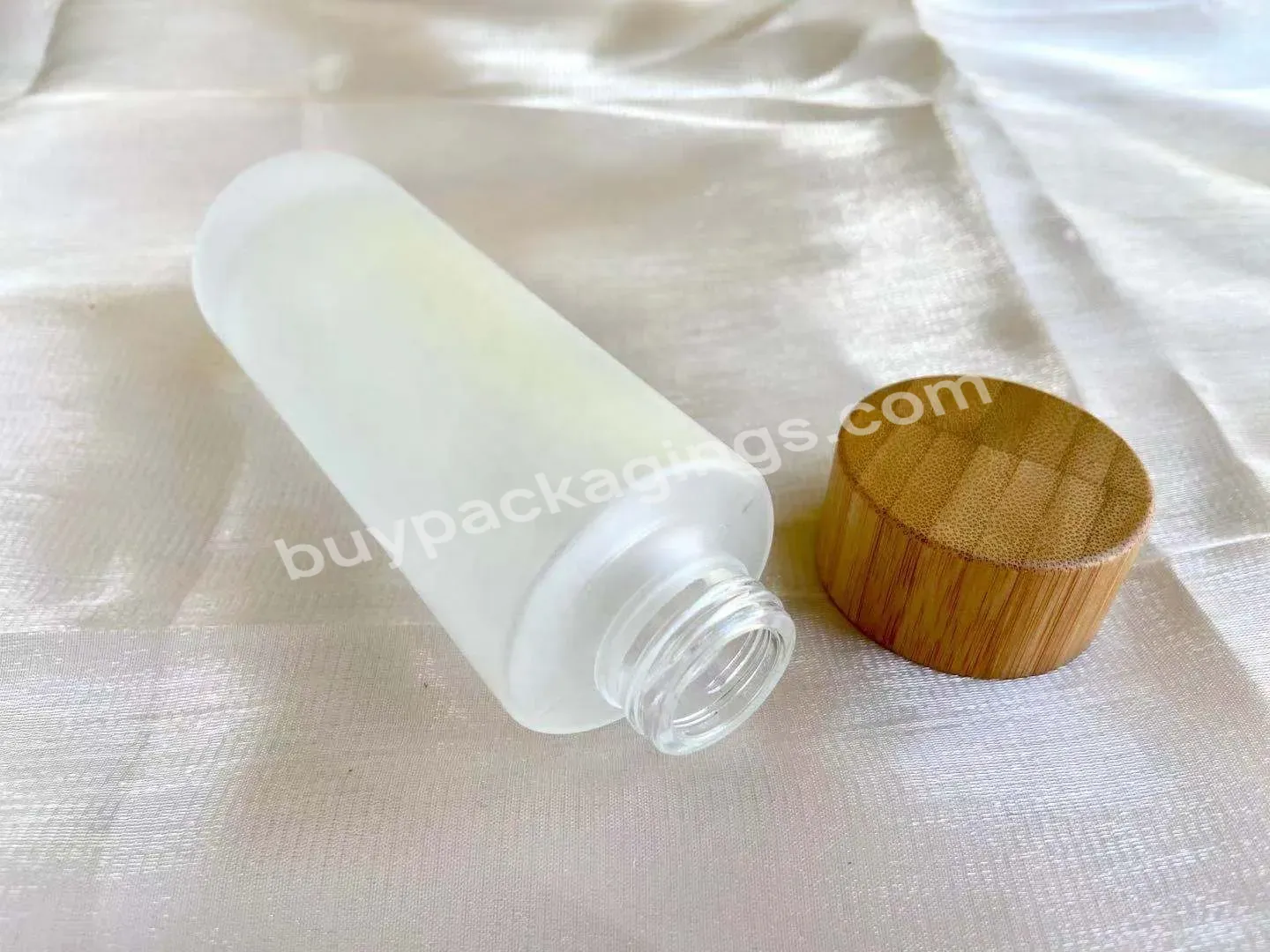100ml Glass Bottle With Bamboo Screw Cap For Lotion Essential Oil Toner Eco-friendly Cosmetic Bottles - Buy Glass Lotion Bottle With Bamboo Lid,Bamboo Bottles,Eco-friendly Bottles.