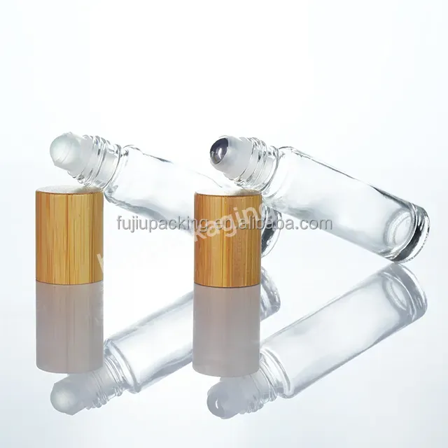 10ml Bamboo Lid Glass Roll On Bottle With Stainless Steel Roller Ball - Buy 10ml Perfume Bottle,Glass Roll On Bottle,Round Glass Oil Bottle.