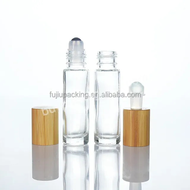 10ml Bamboo Lid Glass Roll On Bottle With Stainless Steel Roller Ball - Buy 10ml Perfume Bottle,Glass Roll On Bottle,Round Glass Oil Bottle.