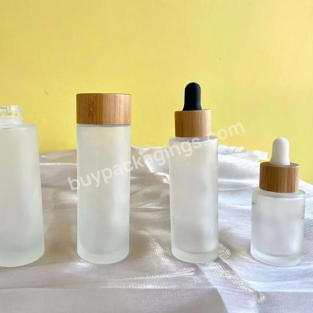 30ml 50ml 100ml 150ml Frosted Glass Essential Oil Jars With Bamboo Lid For Cosmetic Packing - Buy Essential Oil Jars With Bamboo Lid,Bamboo Glass Bottle,Essential Oils Glass Bottle.