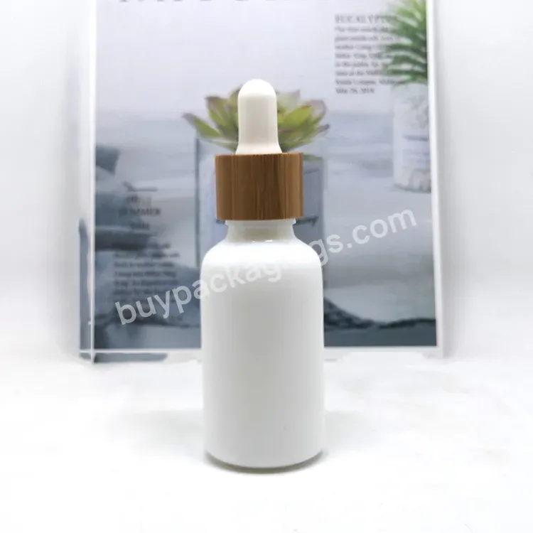 30ml 50ml Cosmetic Skin Care Essential Oil Essence Packaging White Glass Serum Dropper Bottle With Real Bamboo Lids - Buy White Serum Bottle,30ml Frosted Glass Serum Bottle With Rose Gold Dropper Wholesale 20ml 30ml Label Amber Round Shoulder Dropper