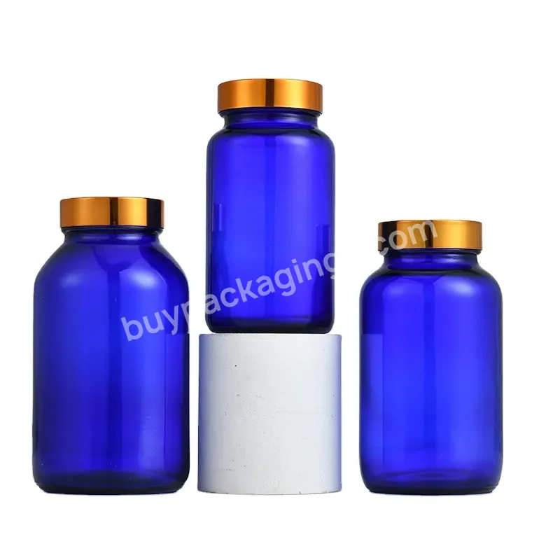75ml Blue Glass Medicine Jar Capsule Medicine Glass Bottle With Gold Cap Lid - Buy Medicine Glass Bottle,Blue Glass Bottle,75ml Glass Bottle.