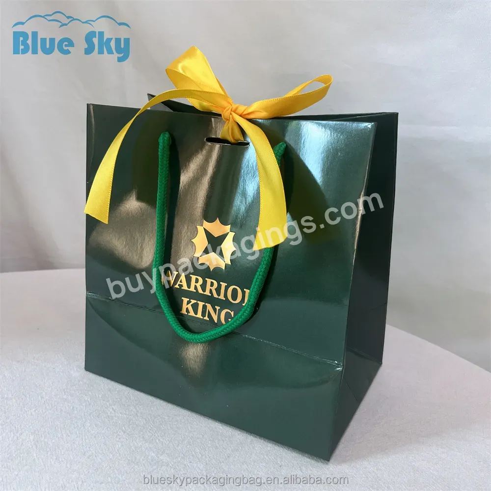 China Maker Customized Glossy Paper Shopping Bag Golden Logo Printed With Ribbon Handle - Buy Paper Packaging Bags,Clothing Shopping Bags,Custom Logo Packaging Bags.