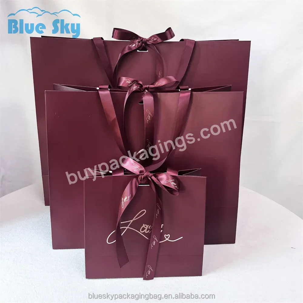 China Maker Customized Paper Shopping Bag With Logo Printed With Ribbon Handle - Buy Paper Packaging Bags,Clothing Shopping Bags,Custom Logo Packaging Bags.