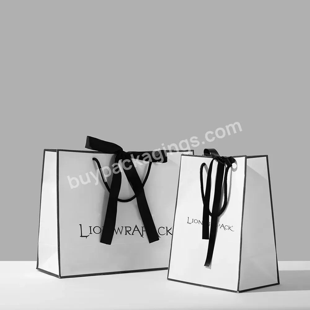 Custom Logo Print Bow White Clothing Shoe Paper Bag Luxury Gift Garment Paper Shopping Bags With Black Ribbon - Buy Clothing Paper Bag,Luxury Paper Shopping Bags,Garment Paper Bag With Logo Print.
