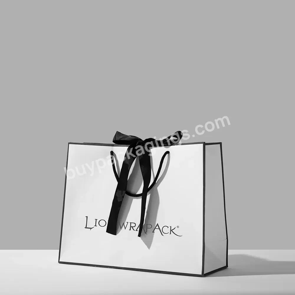 Custom Logo Print Bow White Clothing Shoe Paper Bag Luxury Gift Garment Paper Shopping Bags With Black Ribbon - Buy Clothing Paper Bag,Luxury Paper Shopping Bags,Garment Paper Bag With Logo Print.