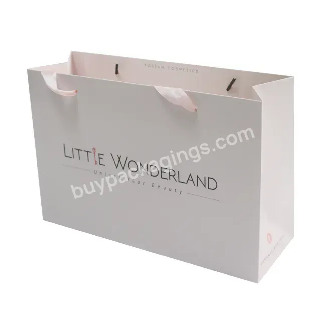 Customized Logo Design Luxury Paper Bag Gift Packaging Bag Shopping Paper Bag With Ribbon Handle - Buy Luxury Shopping Paper Bag,Customized Logo Design Luxury Paper Gift Bag,Paper Gift Packaging Bag With Ribbon Handle.
