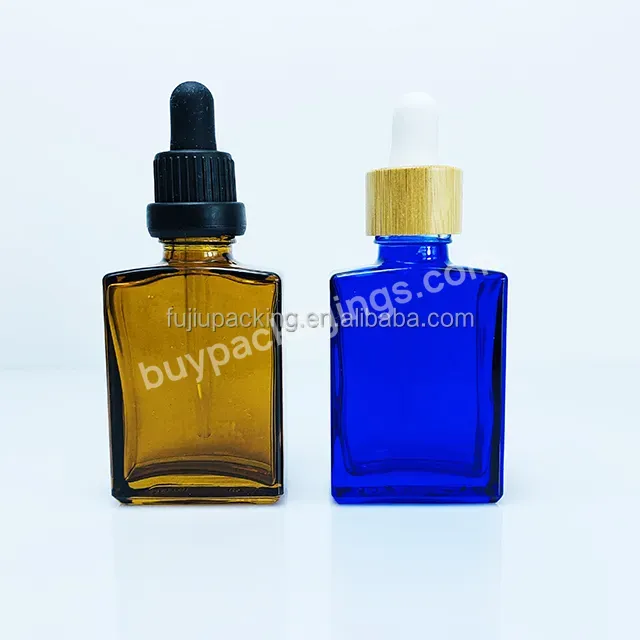 Empty Blue Flat Square Rectangle 15ml 30ml Cosmetic Skincare Packaging Amber Glass Dropper Oil Serum Bottle With Bamboo Cap - Buy Serum Bottle With Bamboo Cap,Hot Selling 12ml 30ml Clear Rectangular Flat Square Glass Bottle With Bamboo,Customized Cos