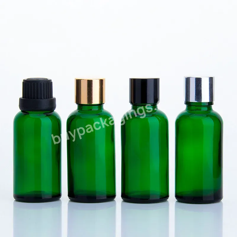 Essential Oil Glass Bottle Green With Dropper With Silver Cap Cosmetic Packaging Screen Printing Aluminum Cap Lid - Buy Essential Oil Green Glass Bottle With Aluminum Cap Lid,Round Green Glass Dropper Bottles With Silver Cap,Glass Dropper Bottles Cos
