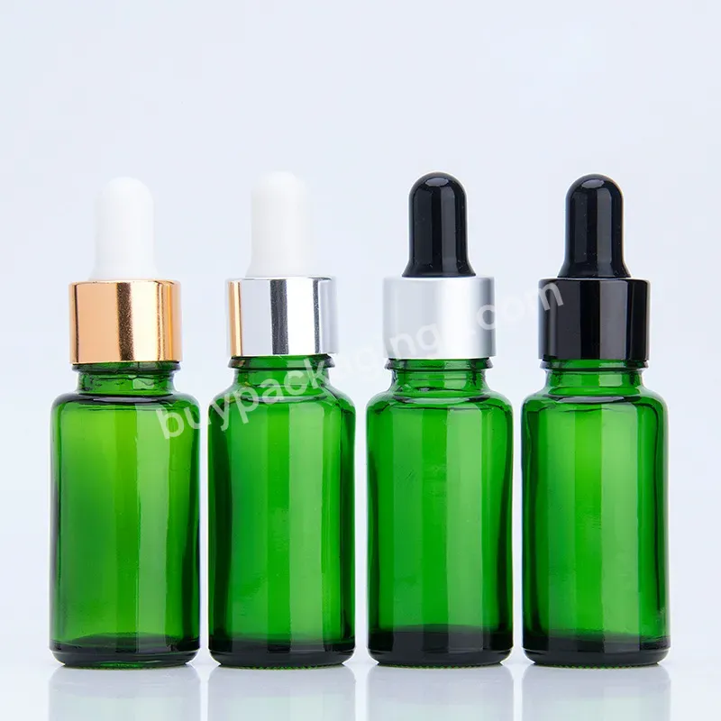 Essential Oil Glass Bottle Green With Dropper With Silver Cap Cosmetic Packaging Screen Printing Aluminum Cap Lid - Buy Essential Oil Green Glass Bottle With Aluminum Cap Lid,Round Green Glass Dropper Bottles With Silver Cap,Glass Dropper Bottles Cos