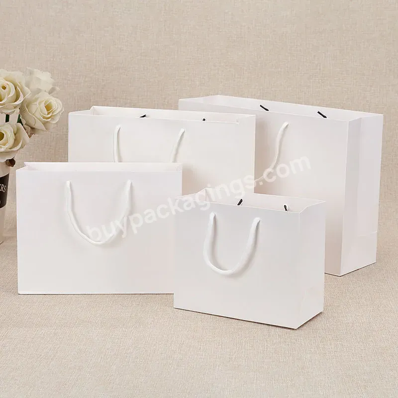 European American Standard Material Custom Made Logos Designs Paper Bag With Handle And Logo - Buy Paper Bag With Ribbon Handle,Paper Gift Bags With Handles,Paper Bag With Handle And Logo.