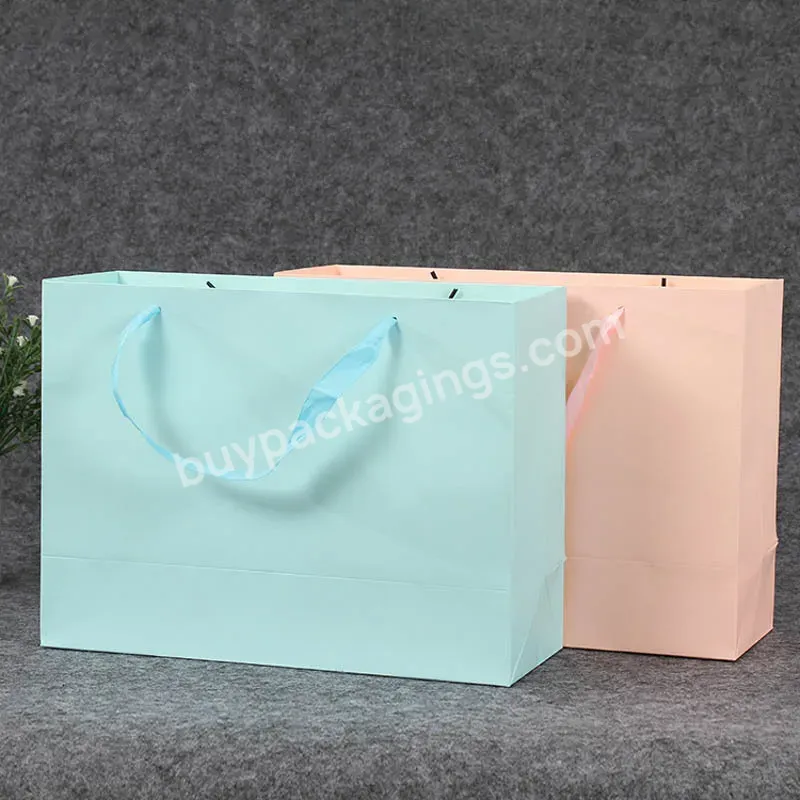 Factory Supply Customized Logo Clothing Gift Bag Handheld Shopping Bag Paper Packaging Bag