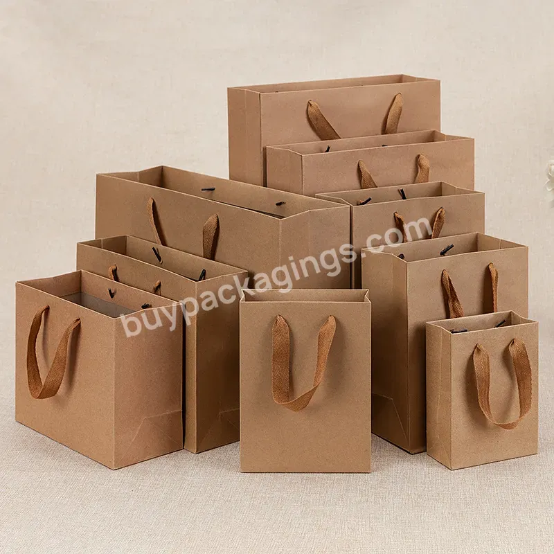 Free Design Custom Kraft Shopping Bags Brown Paper Bags With Handles Bulk Merchandise Bags - Buy Brown Paper Bags,Paper Bags With Handles Bulk,Brown Paper Bags With Handles Large Paper Bags Shopping Bags.