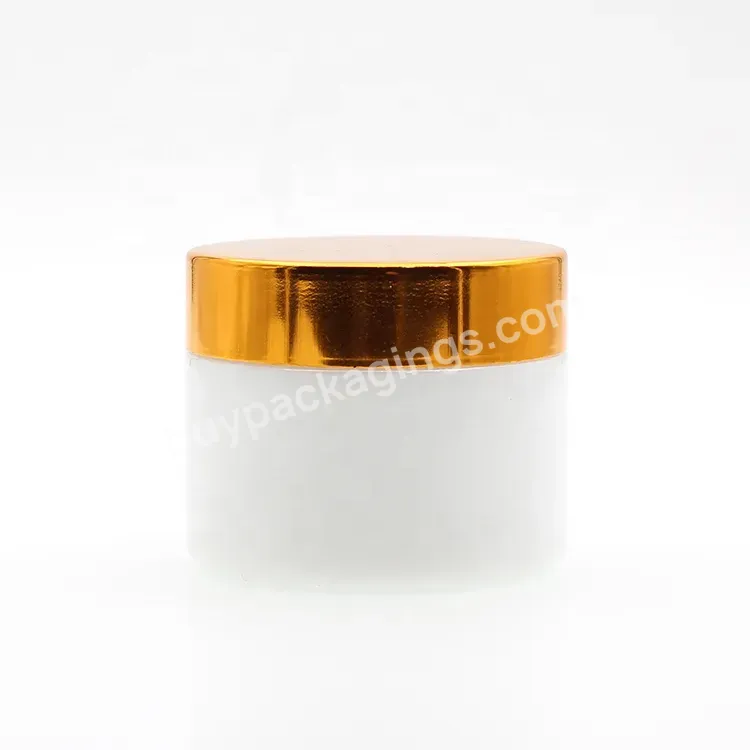 Hot Selling 50g 100g White Ceramic Cosmetic Glass Cream Jar With Plastic Lid Glass Jars And Lids Aluminum Gold Cap Face Care Set