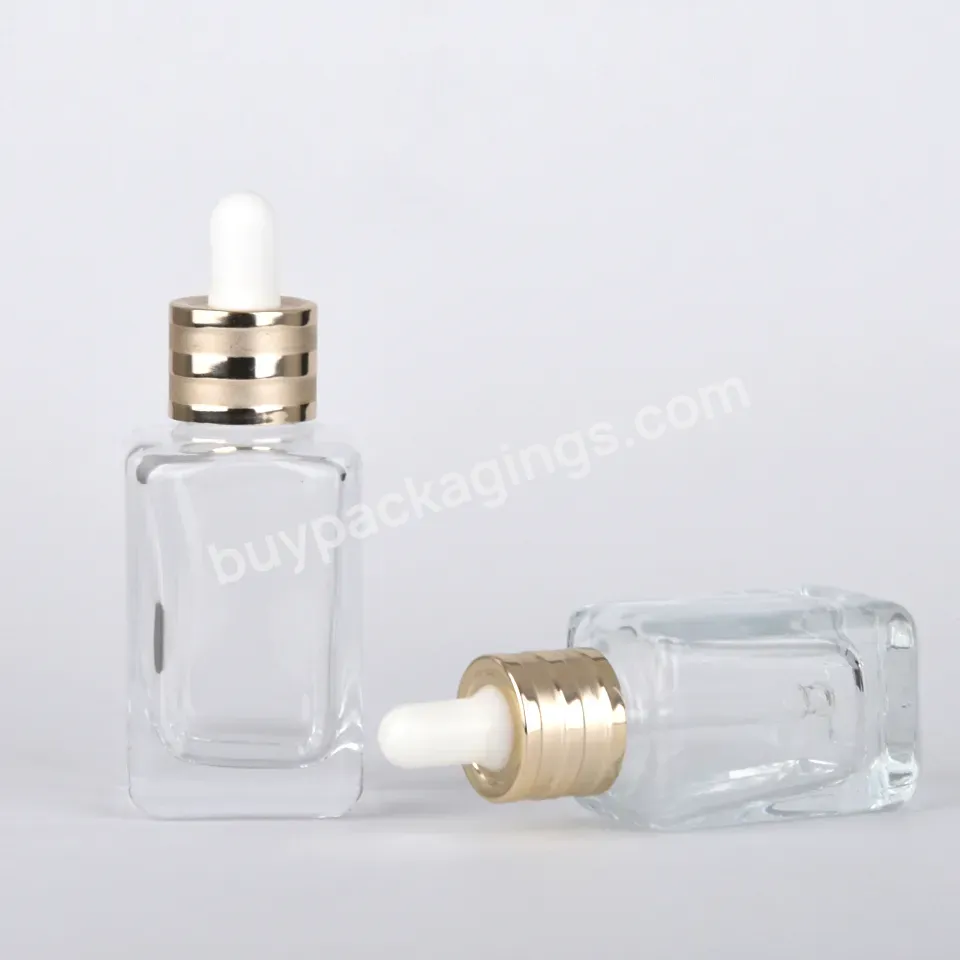 Luxury Cosmetic Glass Bottle Dropper Gold Transparent 30ml 50ml Square Frosted Glass Oil Dropper Bottle - Buy Dropper Bottle,Glass Dropper Bottle,Luxury Cosmetic Glass Bottle Dropper Gold Transparent 30ml 50ml Square Frosted Glass Oil Dropper Bottle.