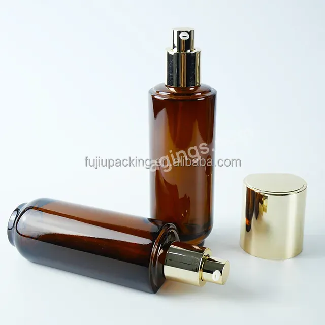 Luxury Cosmetic Skin Care Pump Bottle Round Lotion Glass Bottle With Gold Pump Lid - Buy Fancy Crescent Shape Lotion Glass Bottle With Gold Pump Lid,Unique Cosmetic Glass Pump Bottle Amber Color Lotion Spray Glass Bottle With Gold Pump,30ml 50ml 100m