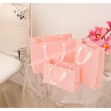 Luxury Custom Design Shopping Bag With Ribbon Handle Gift Bag For Packaging Light Pink Paper Bags - Buy Shopping Bag With Ribbon Handle,Gift Bag For Packaging,Light Pink Paper Bags.