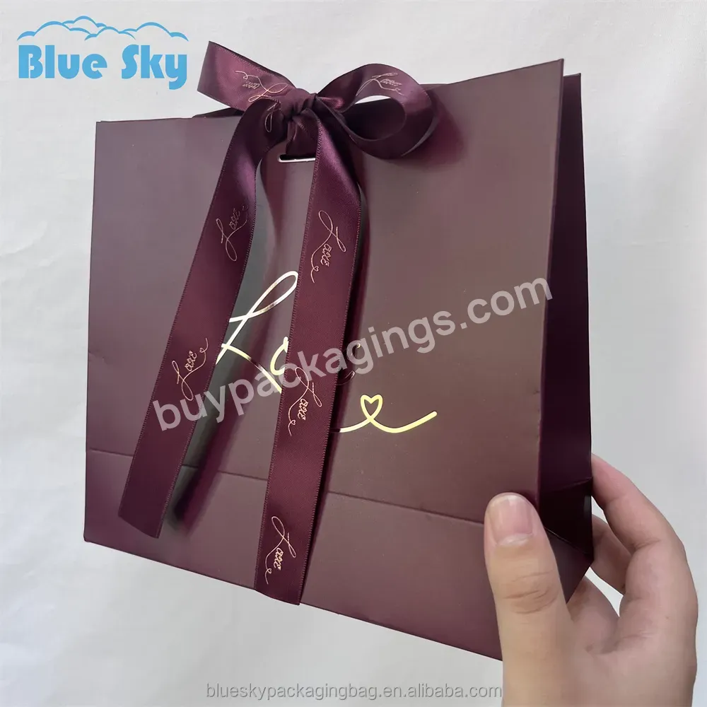 Mass Production Europe And The United States Hot Bright Film Holographic Paper Shopping Bag Gift Bag Paper Bag - Buy Paper Packaging Bags,Clothing Shopping Bags,Custom Logo Packaging Bags.
