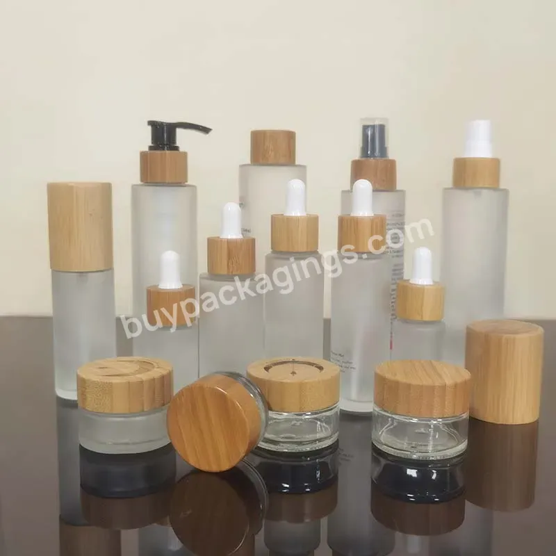 Skin Care 30ml 50ml 100ml 120ml 150ml Frosted Clear Glass Bottle With Bamboo Cap For Lotion Toner Cosmetic Packaging - Buy Glass Bottle With Screw Cap,10ml Glass Bottles With Cap,Bottles For Skin Care Products.