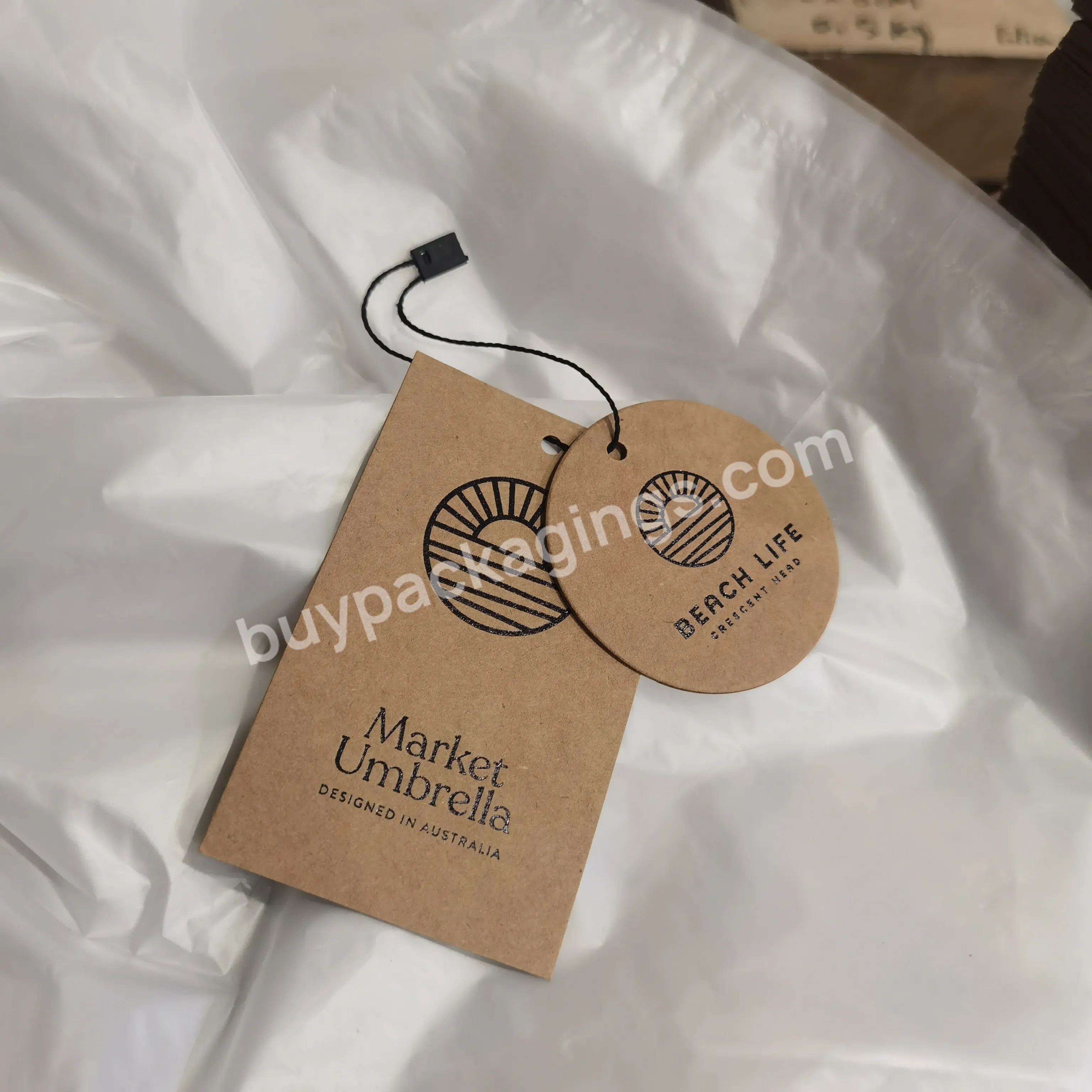 Super Low Moq Custom 100% Recyclable Brown Kraft Paper Hang Tags With Black Foil Printing Logo