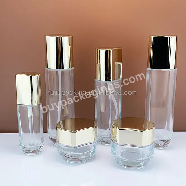 Transparent Cylinder Glass Cosmetic Serum Lotion Pump Bottles Cream Jar With Gold Silver Treatment Bottle - Buy Transparent Cylinder Glass Cosmetic Serum Lotion Pump Bottles Set,Cream Jar With Gold Silver Treatment,Skin Care Cosmetic Bottle Sets.