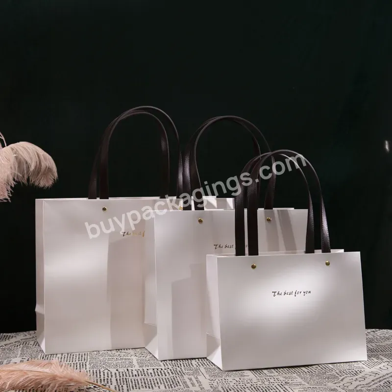 White Kraft Paperbags Customized Luxury Foldable Biodegradable Recycled Portable Reusable Paper Bag For Grocery Boutique