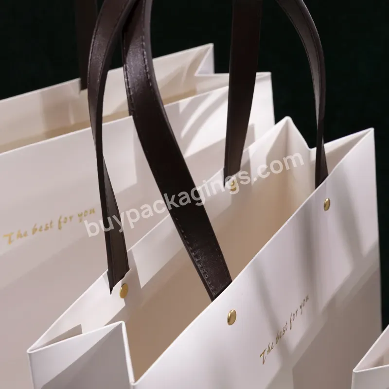 White Kraft Paperbags Customized Luxury Foldable Biodegradable Recycled Portable Reusable Paper Bag For Grocery Boutique