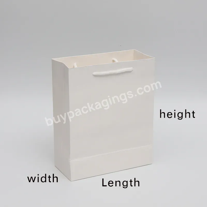 Wholesale Fashion Customized White Boutique Clothing Shopping Gift Packaging Coated Paper Bag - Buy White Paper Bag,Gift Packaging Bag,Coated Paper Bag.