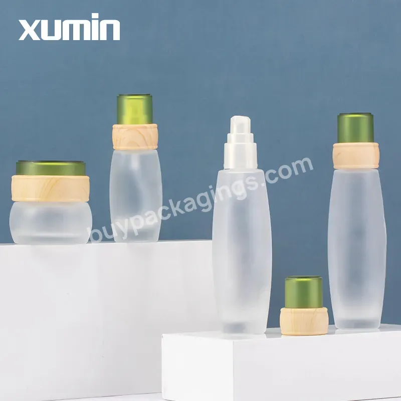 Wholesale Glass Cosmetics Set 50g 40 Ml 50 Ml 100 Ml 120 Ml Cream Bottle And Emulsion Bottle Green Cap Bamboo Cap Frosted Bottle
