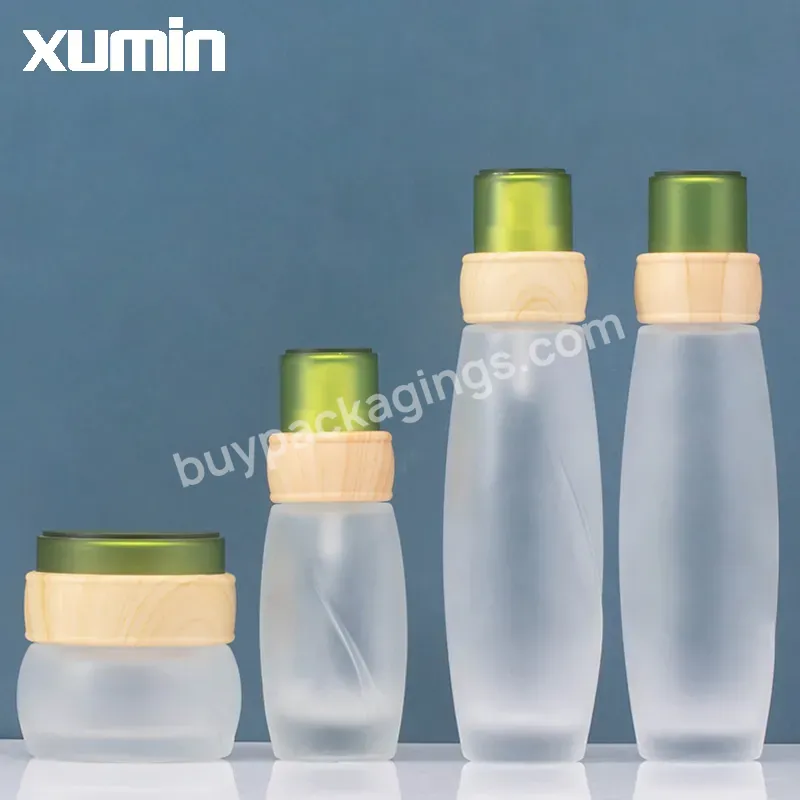 Wholesale Glass Cosmetics Set 50g 40 Ml 50 Ml 100 Ml 120 Ml Cream Bottle And Emulsion Bottle Green Cap Bamboo Cap Frosted Bottle