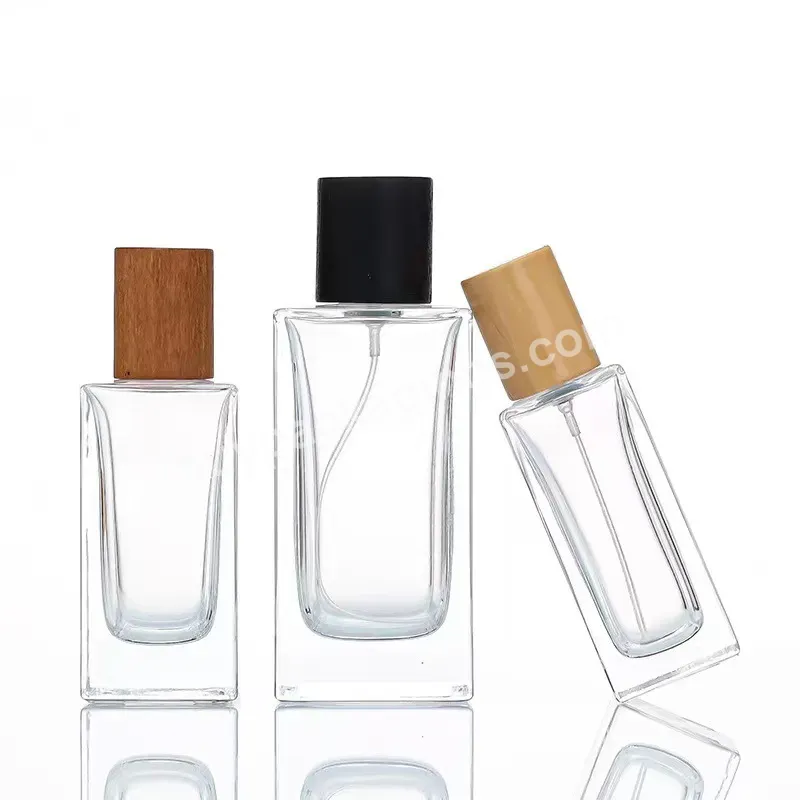 Wholesale Luxury Oem Empty 30ml 50ml 100ml Square Cylinder Spray Glass Perfume Bottle With Wooden Cap - Buy Refillable Perfume Spray Bottle,30 Ml Perfume Bottle,Glass Perfume Spray Bottle.