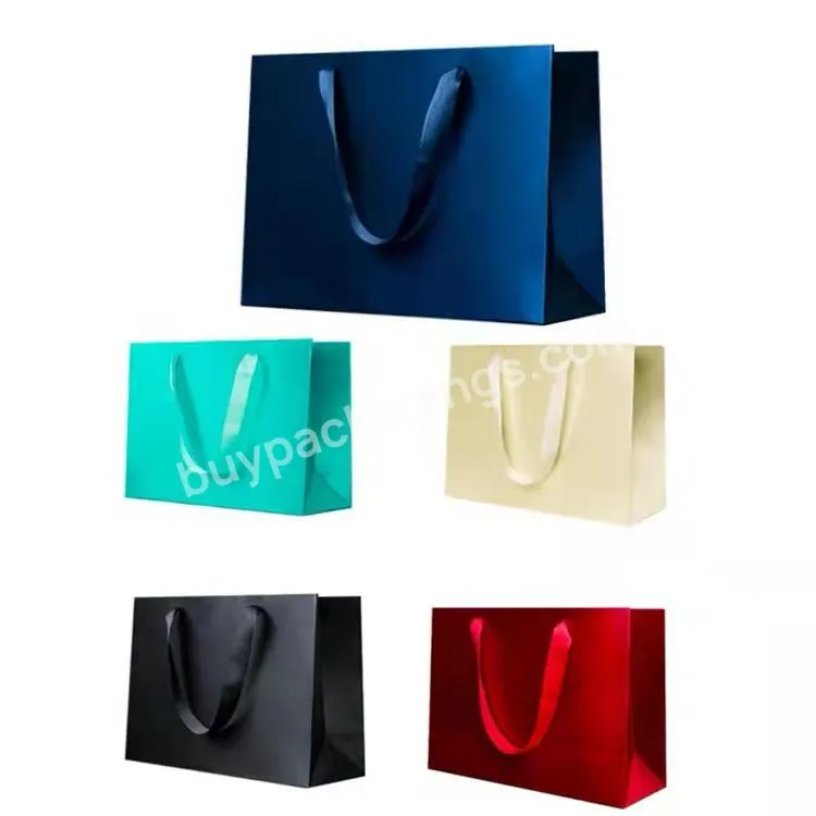 Wholesale Luxury Paper Bag Cosmetic Shopping Gift Solid Color Bag Custom Printed Logo With Silk Ribbon Handles
