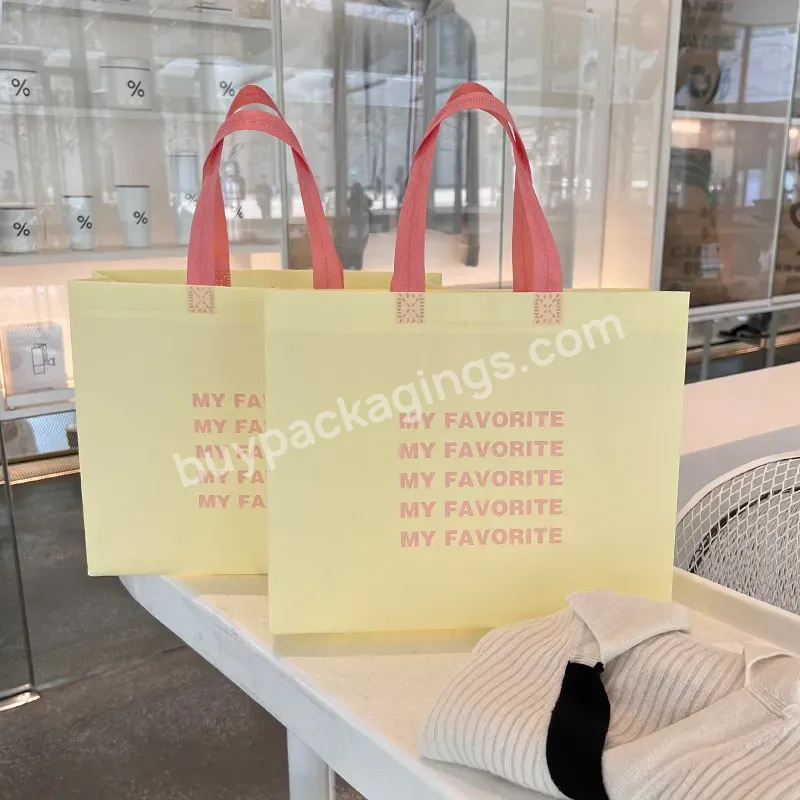 Yellow Fashionable Eco Friendly Non Woven Printing Foldable Luxury Boutique Reusable Custom Logo Pp Shopping Tote Bag For Shop