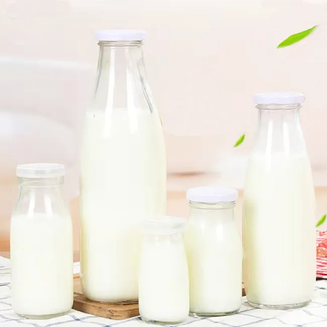 Best Selling Round Shape100ml 200ml 250ml 500ml Milk Glass Bottle With Lid