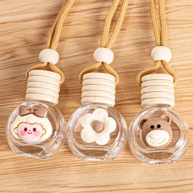 Cartoon Image High Quality Car Pendant Diffuse Glass Material Flat and Round Shape Perfume Bottle