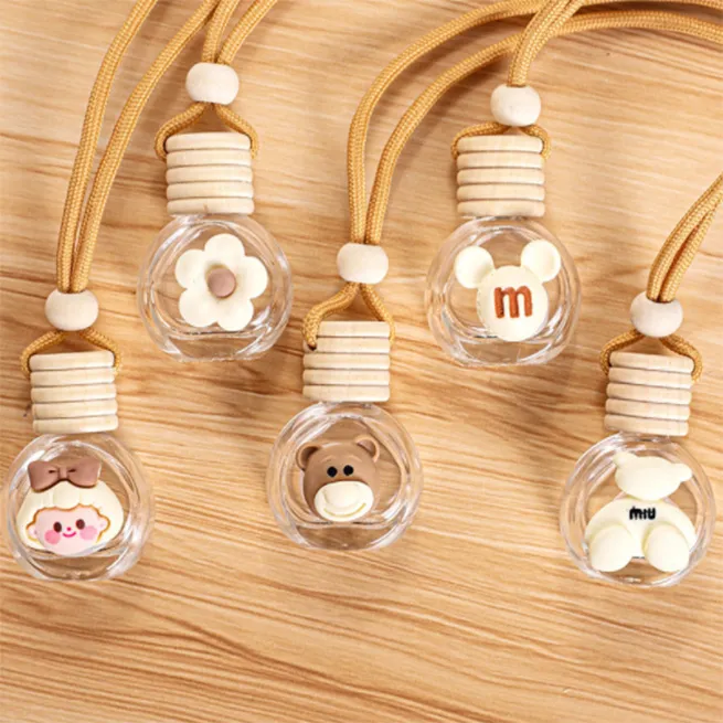 Cartoon Image High Quality Car Pendant Diffuse Glass Material Flat and Round Shape Perfume Bottle