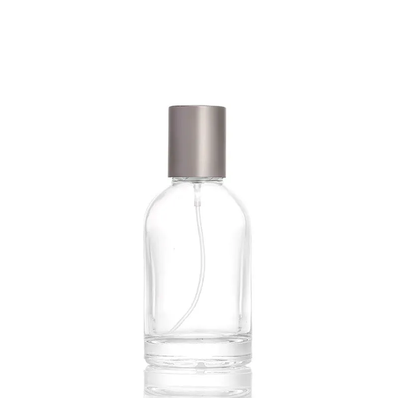 Good Quality Low Price Hot Sale Transparent Clear Body Cylinder Shape Spray Glass Perfume Bottle