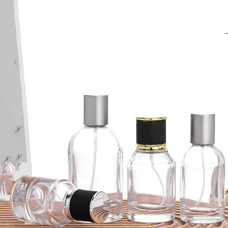 Good Quality Low Price Hot Sale Transparent Clear Body Cylinder Shape Spray Glass Perfume Bottle