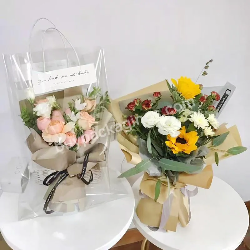 Jaywood Hot Sale 20pcs Waterproof Plastic Wrapping Handbags Gift Packaging Transparent Flower Carrier Bag With Paper Handle