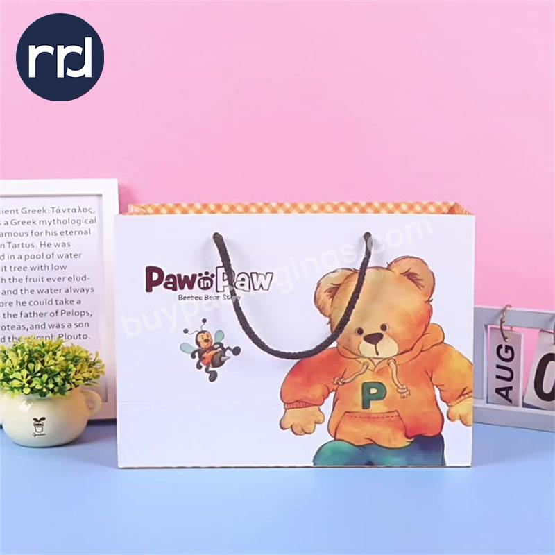RR Donnelley Factory Wholesale Luxury Custom Paper Bag Logo Printed Business Clothing Shoes Shopping Gift Bags with Handles