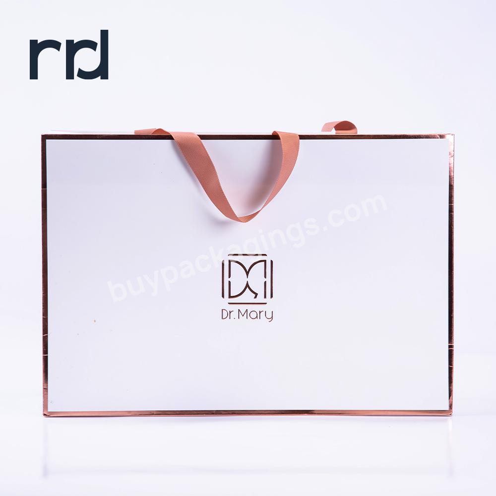 RR Donnelley High Quality Good Sale Custom Logo White Kraft Flat Paper Clothing Cosmetic Gift Shopping Tote Bags with Handles