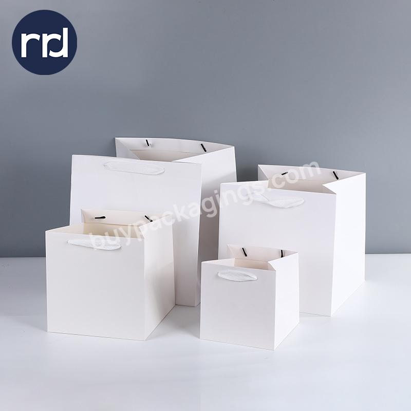 RR Donnelley OEM Manufacturer Packaging Customized Print Cheap White Kraft Paper Clothing Shopping Bags with Handles
