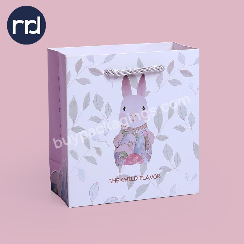 RR Donnelley Wholesale Luxury Perfume Essential Oil Packaging Small Paper Birthday Goodie Cosmetic Gift Bags with Ribbon Handles