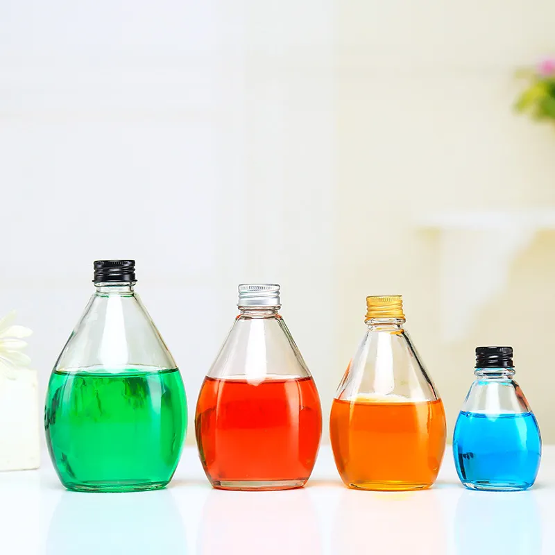 Transparent Drop Shape 330ml Beverage Water Glass Bottle With ScrewCork  Lid