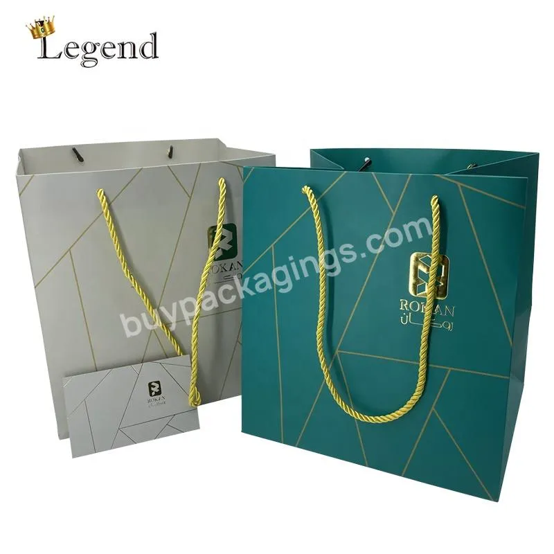 Wholesale Gold hot stamping Embossed Logo Luxury Paper Shopping Bags Packaging Beauty Custom Square Bottom Paper Bag