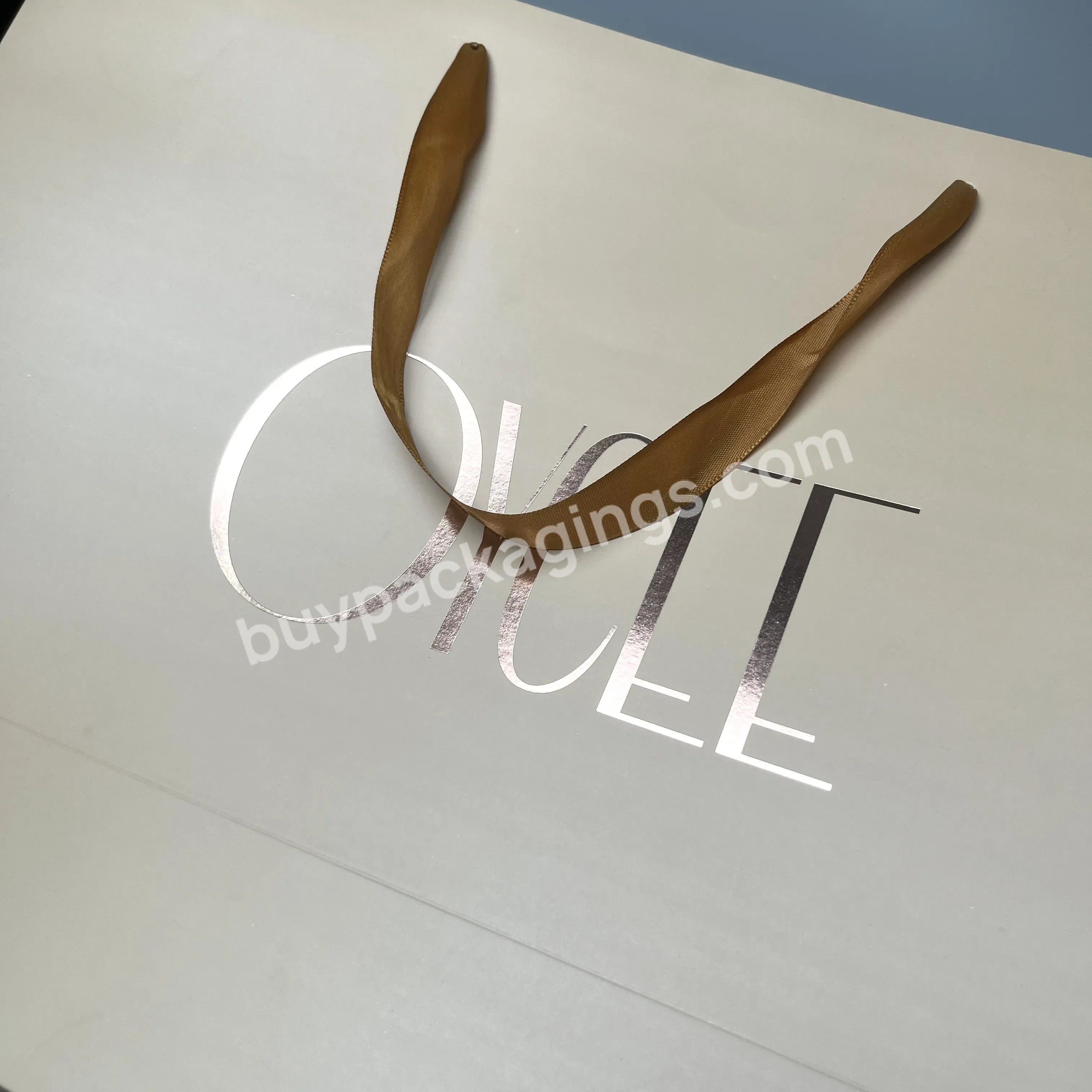 100% Recyclable Custom Popular Cream Color Cardboard Bag Printing Rose Gold Foil Logo Shopping Bag