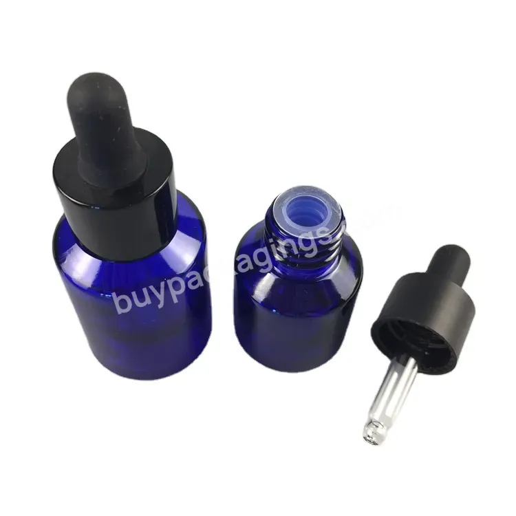 100ml Empty Glass Bottle Cobalt Blue Bottle With Cream Pump And Transparent Over Cap For Cosmetic Cream