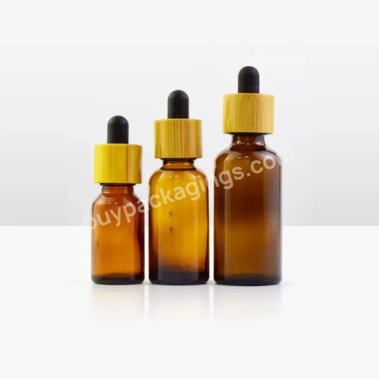 10ml 15ml Cosmetic Skincare Packaging Cylinder Amber Beard Hair Essential Oil Serum Glass Dropper Bottle With Bamboo Wood Lid